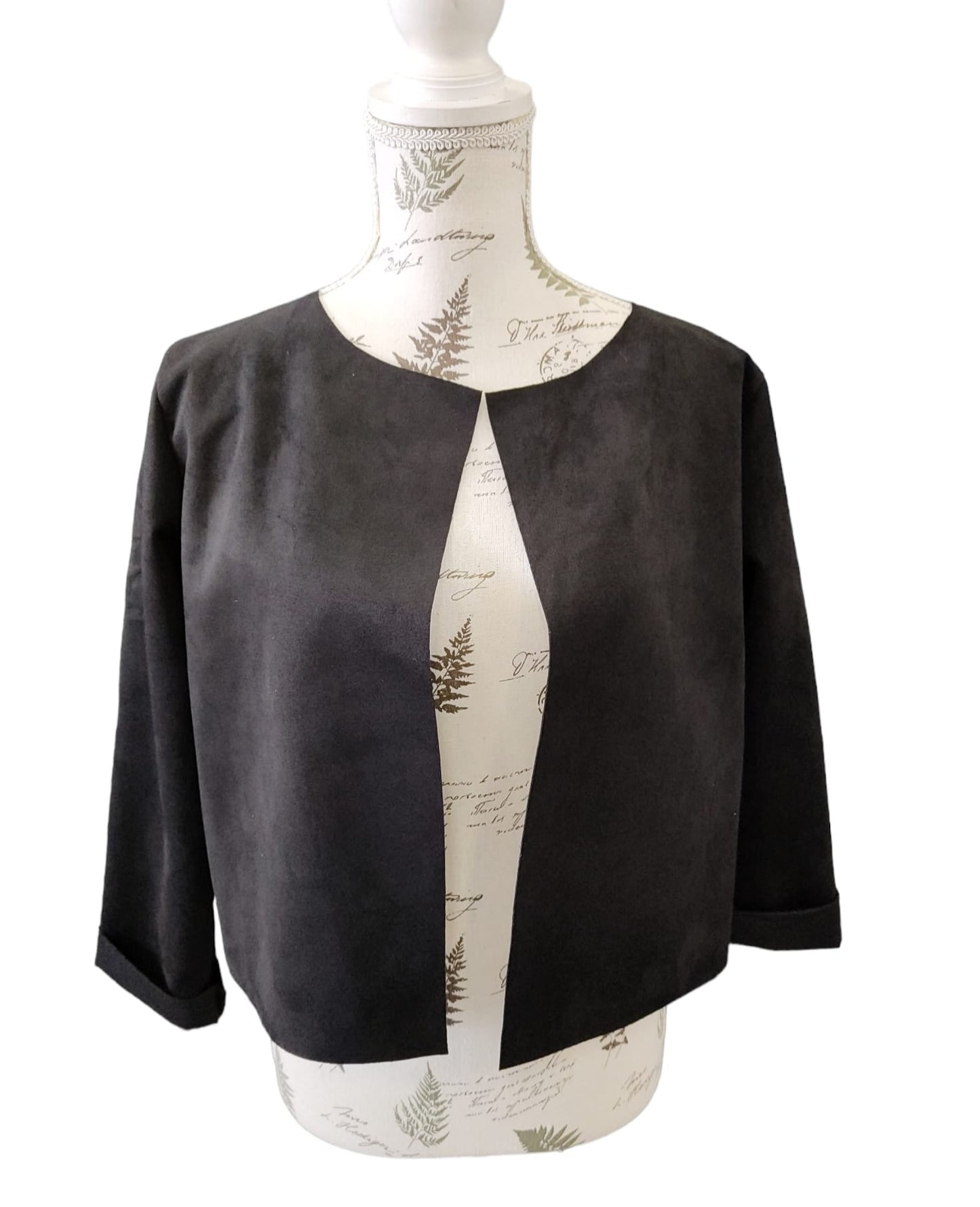Shoulder cover in suede fabric