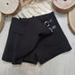 Shorts Nero con Piega Plissé Obliqua Pantaloncino Gonna Tessuto Scuba Ativo Kids Bambina/Ragazza 4-12 Anni