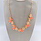 Collana Girocollo con Fiorellini Arancio e Avorio in Zama